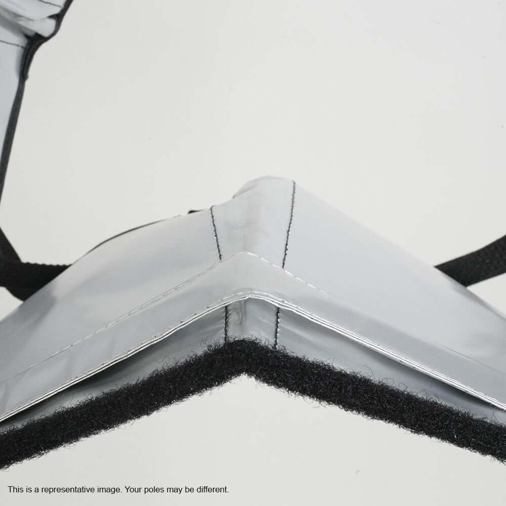 Close-up of a shiny silver POP bank replacement stave used in photography, indicating internal structure and design.