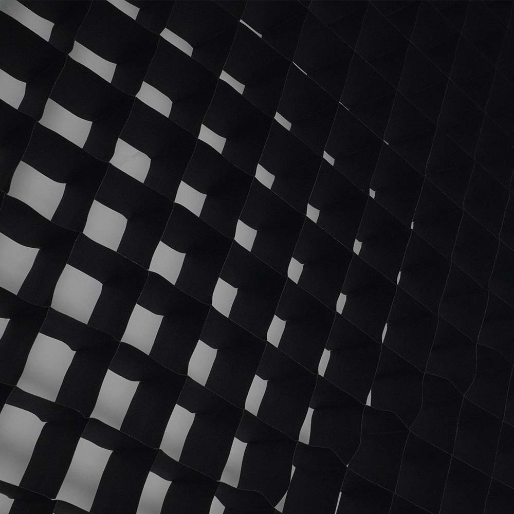Close-up of Lighttools® Soft Egg Crate® fabric grid structure for photography lighting control.